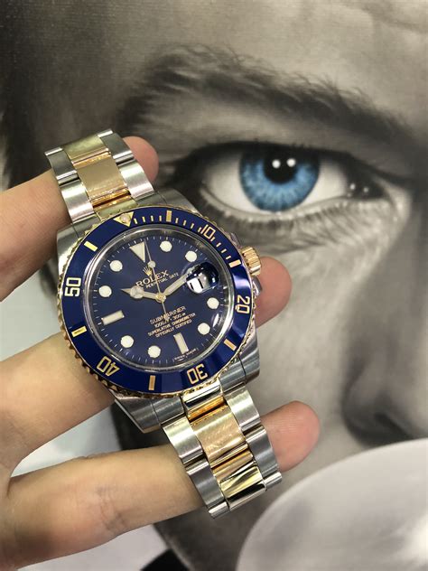 rolex submariner gold blue on wrist|Rolex 116613 ceramic year.